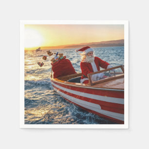 Weihnachtsmann fährt ein Speedboot Serviette