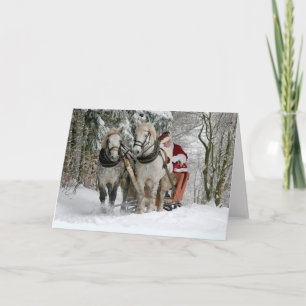 Weihnachtsmann fährt mit einem Pferdeschlitten Karte