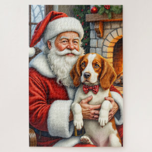 Weihnachtsmann hält Brittany Spaniel Weihnachtskun