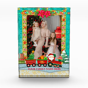 Weihnachtsmann im Zug mit Geschenken und Weihnacht Fotoblock