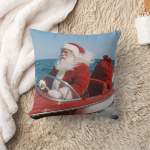 Weihnachtsmann liefert Geschenke per Schnellboot Kissen
