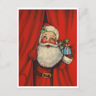 Weihnachtsmann mit einem Geschenk hinter dem Vorha Postkarte