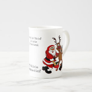 Weihnachtsmann mit Elch - Frohe Weihnachten Prozellantasse