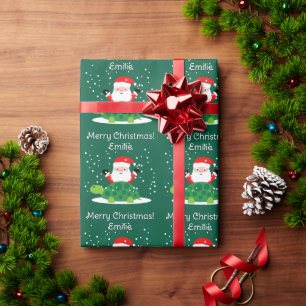 Weihnachtsmann mit grüner Schildkröte Cartoon Weih Geschenkpapier