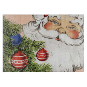 Weihnachtsmann mit Weihnachtsbaumschmuck im Vintag Schneidebrett