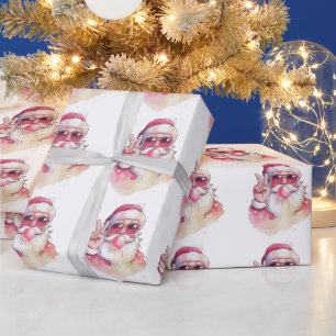 Weihnachtsmann pustet Kaugummi rosa Sonnenbrille  Geschenkpapier