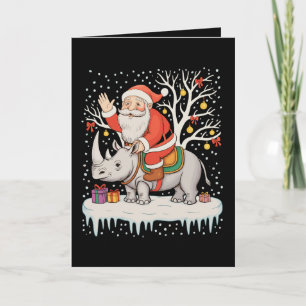 Weihnachtsmann reitet auf Nashorn Schnee Weihnacht Karte