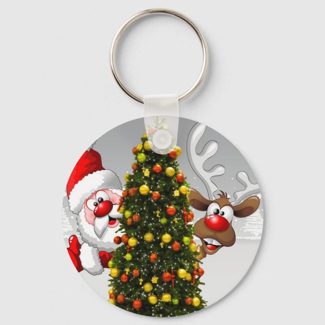 Weihnachtsmann und Rentiere hinter einem Weihnacht Schlüsselanhänger (Vorderseite)