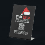 Weihnachtsmannmütze, Besuch Santa, QR Code Queue Sockelschild<br><div class="desc">Dieses Podestschild ist perfekt für jeden,  der einen Besuch im Santa-Ereignis abhält. Dieses Zeichen dient dazu,  Kunden zum Scannen eines QR-Codes zu bewegen,  um sich der Warteschlange anzuschließen,  um den Weihnachtsmann zu besuchen. Ideal für kommerzielle und einheimische Veranstaltungen.</div>