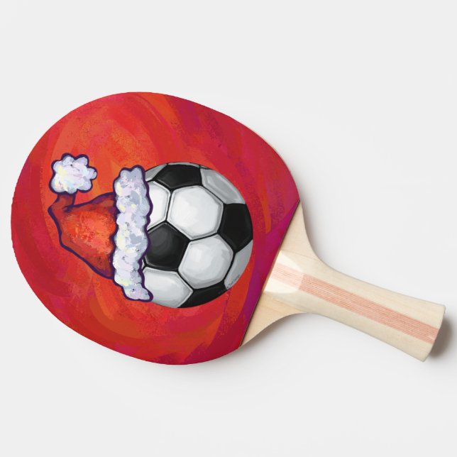 Weihnachtsmannmütze Fußball auf Rot Tischtennis Schläger (Seitenansicht)