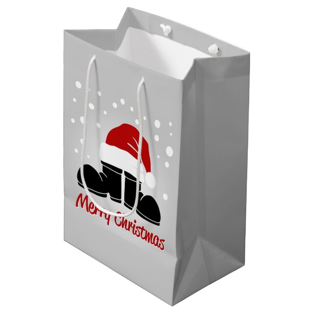 Weihnachtsmannmütze und Stiefel Mittlere Geschenktüte (Vorderseite Schrägansicht)