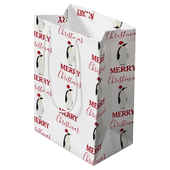Weihnachtspenguin Funny Animal mit Weihnachtsmannm Mittlere Geschenktüte (Rückseite Schrägansicht)