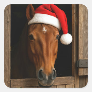Weihnachtspferd im Stallfenster Quadratischer Aufkleber