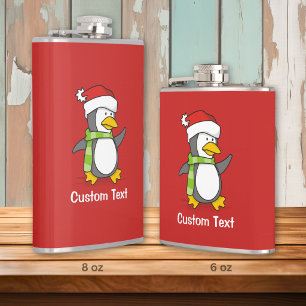 Weihnachtspinguin läuft auf Schnee Flachmann