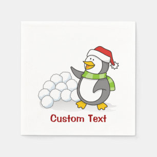Weihnachtspinguin mit Schneebälle schwingen Serviette