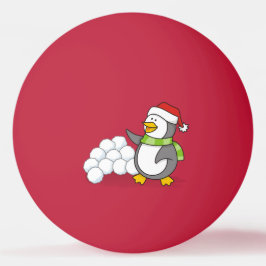 Weihnachtspinguin mit Schneebälle schwingen Tischtennisball