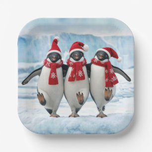 Weihnachtspinguine tanzen auf arktischem Gletscher Pappteller