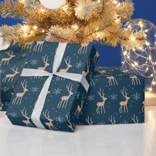Weihnachtsrentier und Schneeflocke blau Geschenkpapier