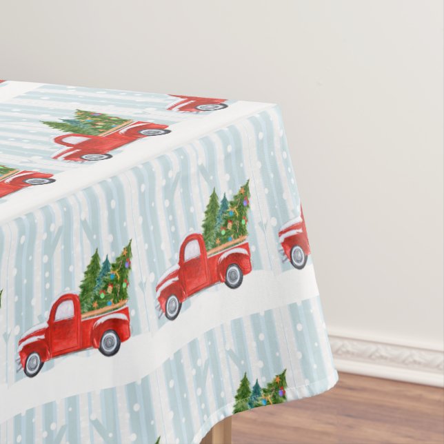 Weihnachtsroter Lieferwagen-LKW auf einer Tischdecke (Beispiel)