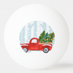 Weihnachtsroter Lieferwagen-LKW auf einer Tischtennisball
