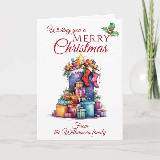 Weihnachtssack und Geschenkfamilie Feiertagskarte (Vorderseite)