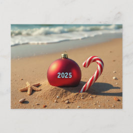 Weihnachtsschmuck auf der Strandurlaubskarte Feiertagspostkarte