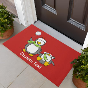 Weihnachtsschneeball werfende Pinguine Fußmatte