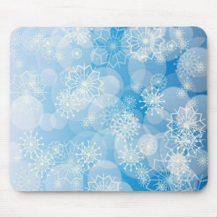 Weihnachtsschneeflocken auf blauem Hintergrund Mousepad