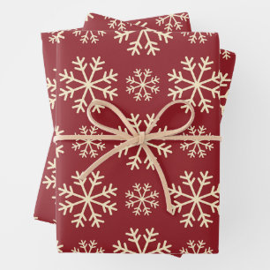 Weihnachtsschneeflocken im dunkelroten Hintergrund Geschenkpapier Set