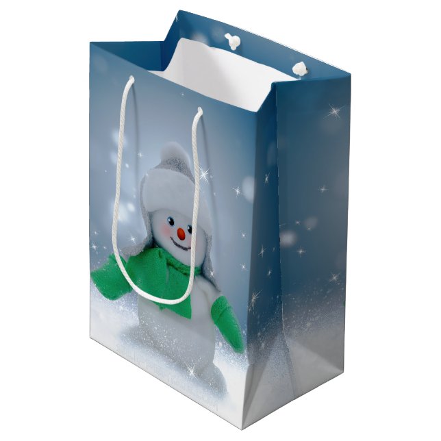 Weihnachtsschneemann SlipperyJoe grüner Schal m Mittlere Geschenktüte (Vorderseite Schrägansicht)