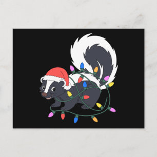 Weihnachtsstinktier Weihnachtsmannmütze verheddert Feiertagspostkarte