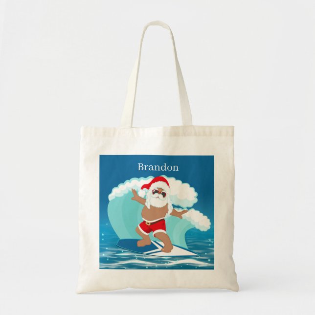 Weihnachtsstrand Der Weihnachtsmann gibt den Kinde Tragetasche (Vorne)