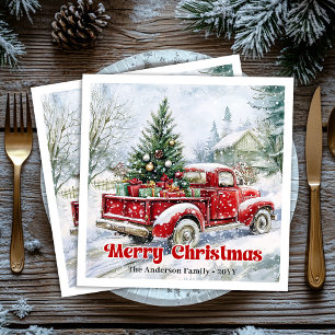 Weihnachtsszene mit festlichem rotem LKW auf rusti Serviette