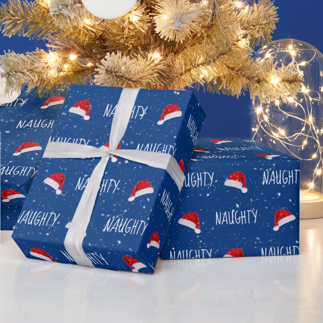 Weihnachtstext mit Weihnachtsmannmützen Geschenkpapier (Feiertage)