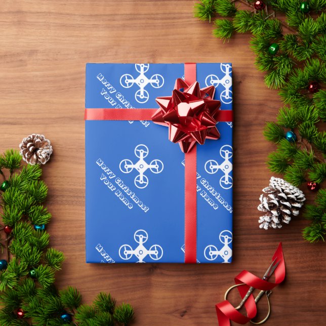 Weihnachtsverpackung von Kid mit Flugdrohne Geschenkpapier (Feiertagsgeschenk)