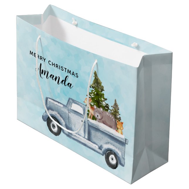 Weihnachtswagen mit Pinienbäumen und Waldtieren Große Geschenktüte (Vorderseite Schrägansicht)