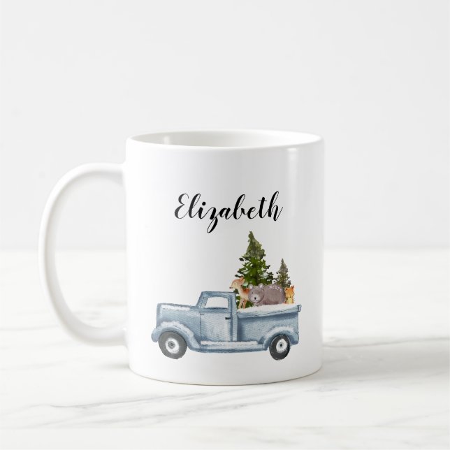 Weihnachtswagen mit Pinienbäumen und Waldtieren Kaffeetasse (Links)