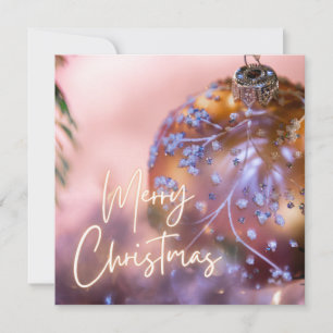 Weihnachtswünsche auf einem rosa Zierhintergrund # Feiertagskarte