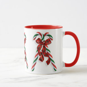 Weihnachtszuckerstangen und Bänder Tasse