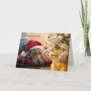 Weimaraner-Hund an Weihnachten neben einem Baum Karte