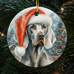 Weimaraner Hund mit Weihnachtsmannmütze Weihnachte Keramik Ornament<br><div class="desc">Lassen Sie sich von unserem bezaubernden Weimaraner Hund mit der Weihnachtsdekoration der Weihnachtsmannmütze verzaubern und zeigen Sie ein festliches Porträt Ihres in einer skurrilen Weihnachtsmannmütze geschmückten Hundes. Dieses einzigartige Ornament ist ein Muss für jeden Weimaraner Liebhaber, der eine Touch der Individualität zu Ihrem saisonalen Display hinzufügt. Überraschen Sie einen stolzen...</div>
