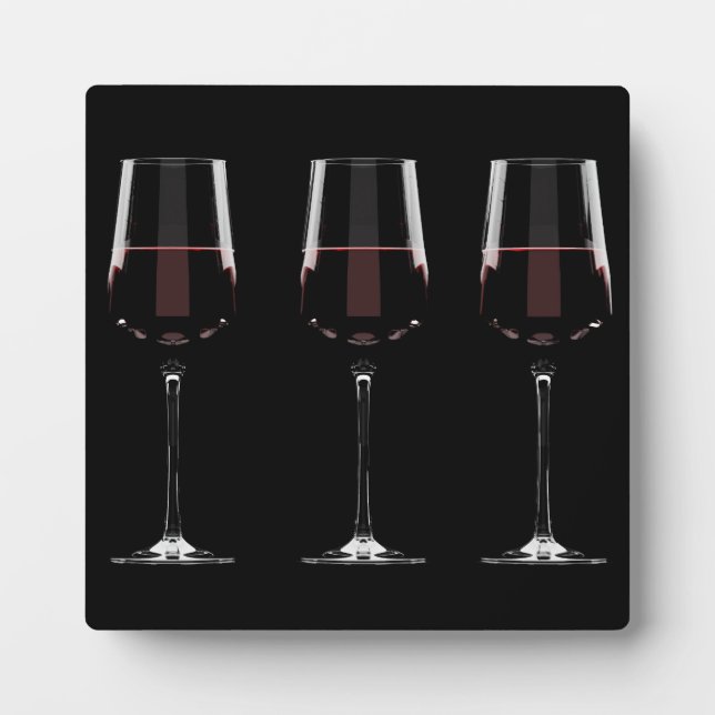 Weingläser mit Rotwein auf schwarz Fotoplatte (Vorderseite)