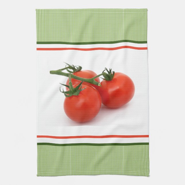 Weinreifen Frische Tomaten auf grüner Küche Geschirrtuch (Vertikal)