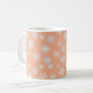 Weiße 3-D Schneeflocken auf einem Pfirsichgrundstü Kaffeetasse