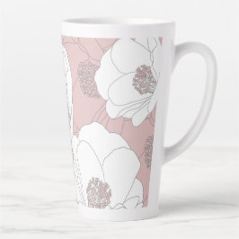 Weiße Blume in hellrosa Milchtasse