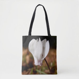 Weiße Cyclamen überall auf der Drucktasche Tasche