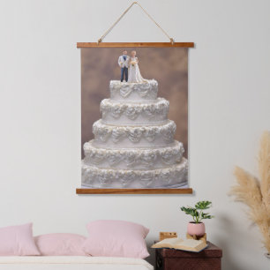 Weiße fünfstöckige Hochzeitstorte mit Brautpaar, Wandteppich Mit Holzrahmen