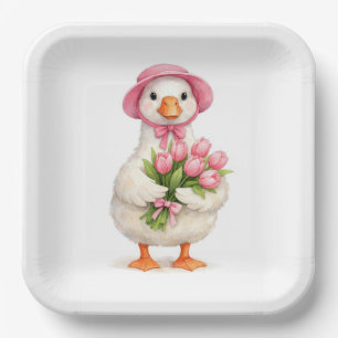 Weiße Gans hält rosa Tulpenstrauß Pappteller