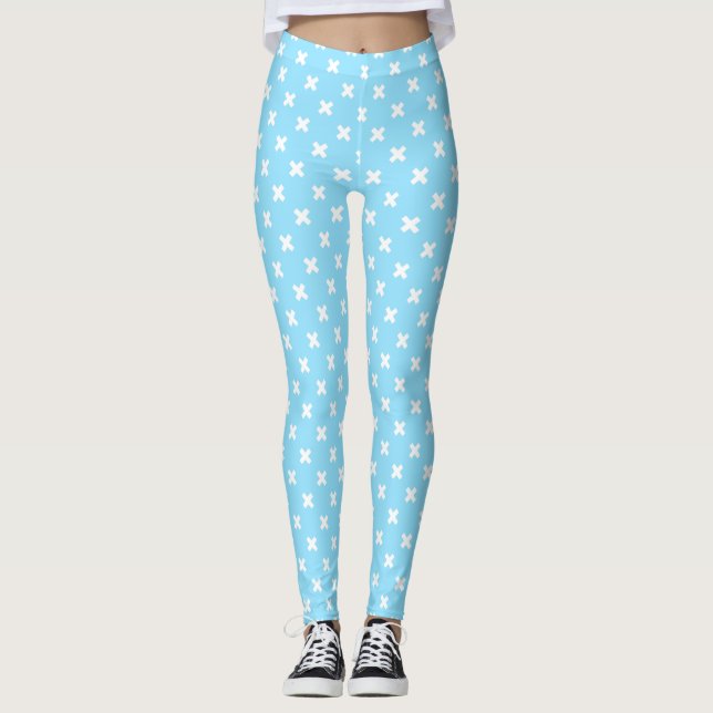 Weiße Kreuzstiche auf Babyblau Leggings (Vorderseite)