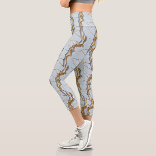 Weiße Marmortextur mit rissigen Goldadern Capri Leggings